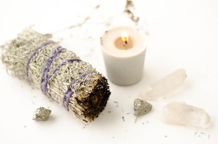 Sage smudge and white candle spell