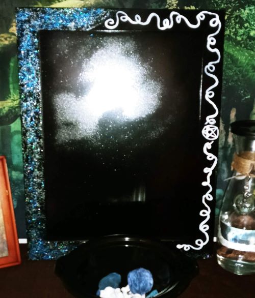 A coven member's black mirror.