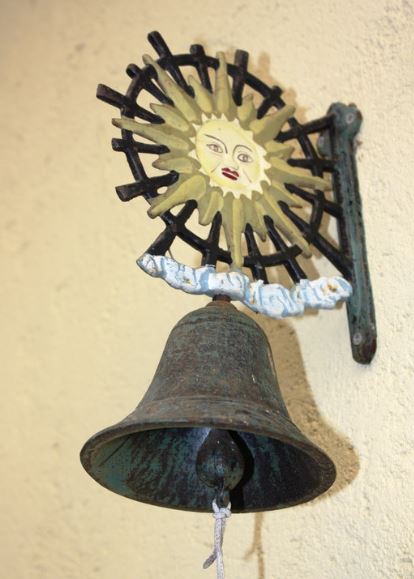 Hanging bells on the door meaning