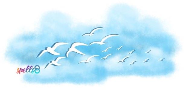 White birds flying across blue clouds.